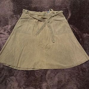 Asymmetrical corduroy brown skirt. Size 12.